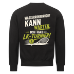 Wasserrohrbruch auf Sweatshirt, Farbe schwarz