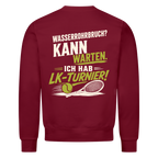 Wasserrohrbruch auf Sweatshirt, Farbe weinrot