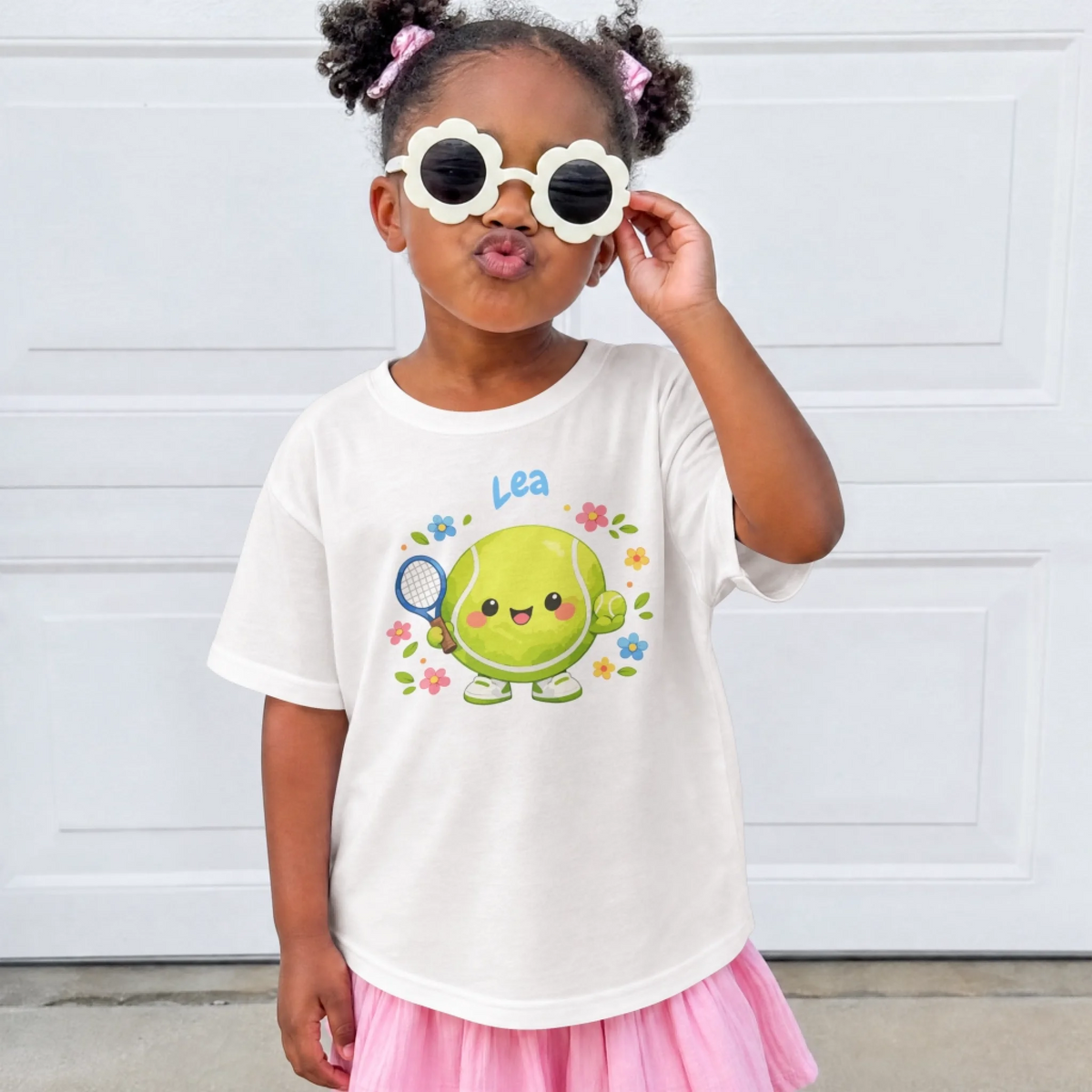 Tennisball Maskottchen auf Kinder-Shirt